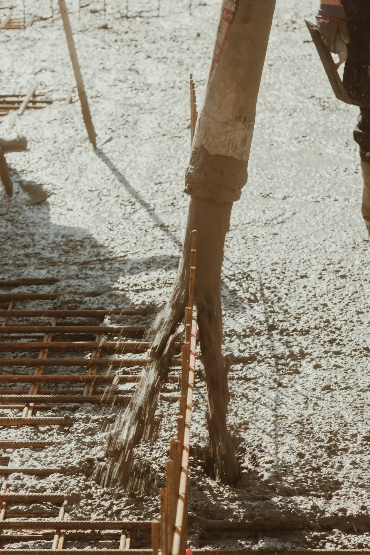 Concrete being placed over reinforcing steel, the step that needs cold-weather protection when pouring concrete in winter